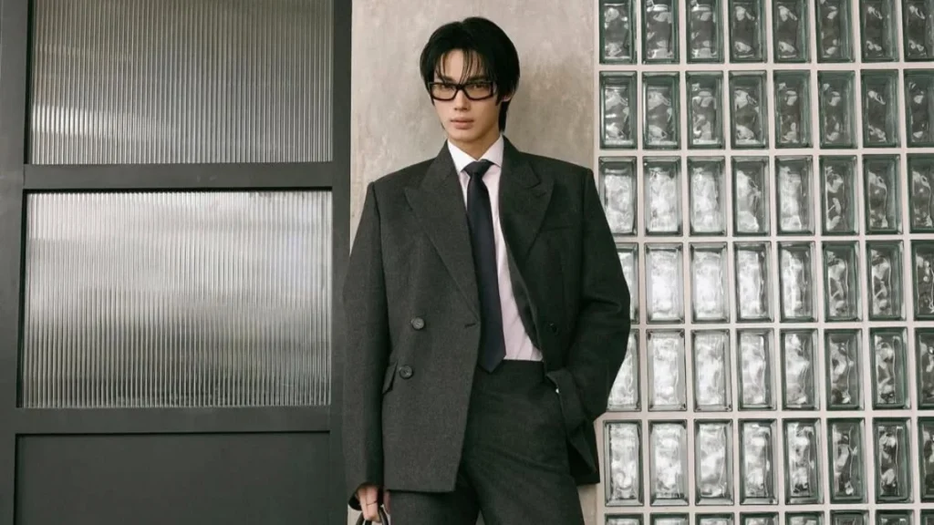 Person in modern suit and sunglasses