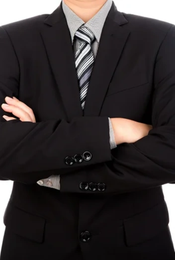 A single-breasted suit features a jacket with a single column of buttons and a narrow overlap. It is the most versatile suit style, suitable for both formal and casual settings. Available in various fits and fabrics, it offers a timeless and modern look for any occasion.