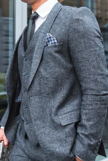A single-breasted suit features a jacket with a single column of buttons and a narrow overlap. It is the most versatile suit style, suitable for both formal and casual settings. Available in various fits and fabrics, it offers a timeless and modern look for any occasion.